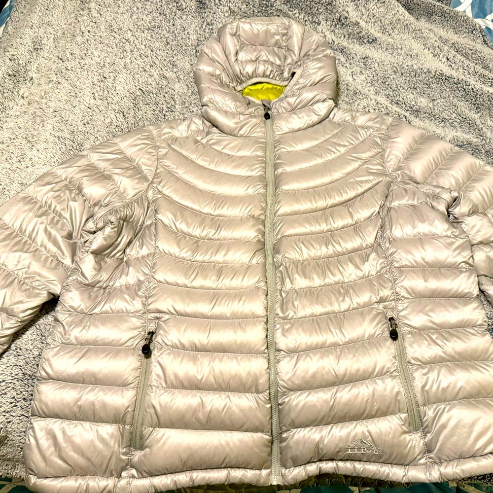 L.L. Bean women’s Downtek water repellent stow away down hooded jacket.